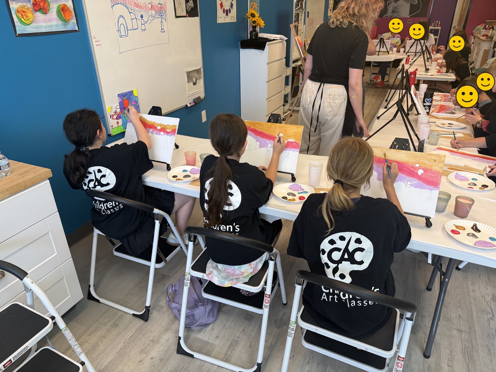 Young artists painting at Children's Art Classes of Cary