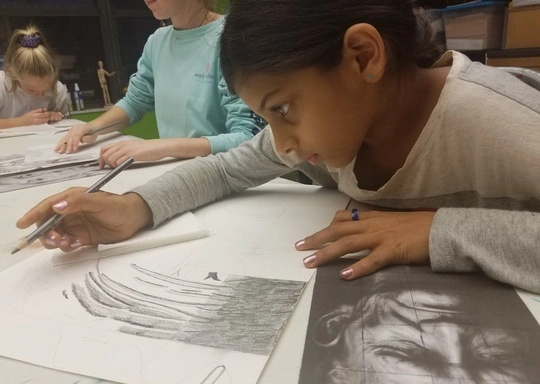 An ebony pencil grid drawing made by a student at Children's Art Classes